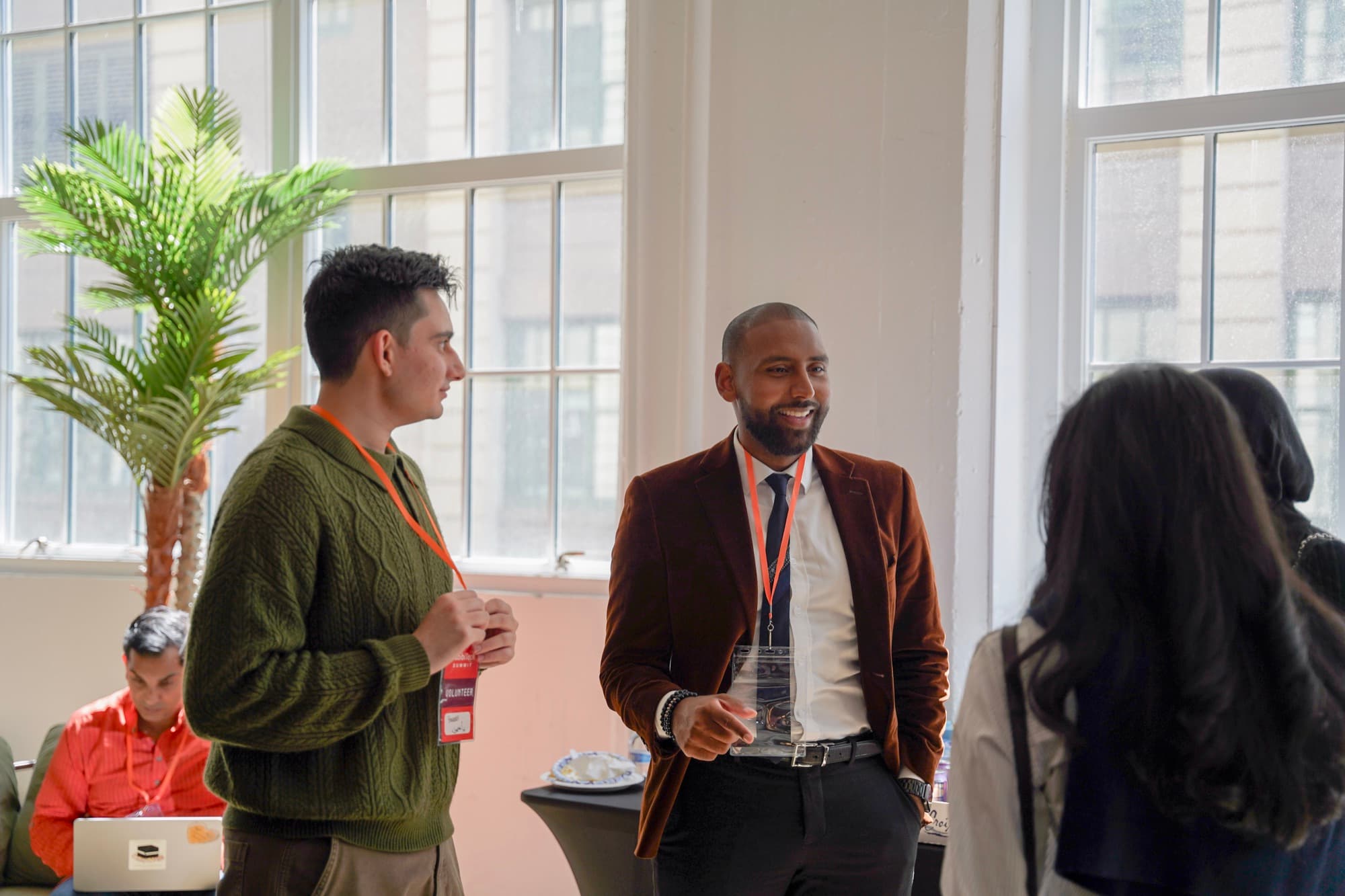 Two attendees in conversation at a New York Strategy client event.